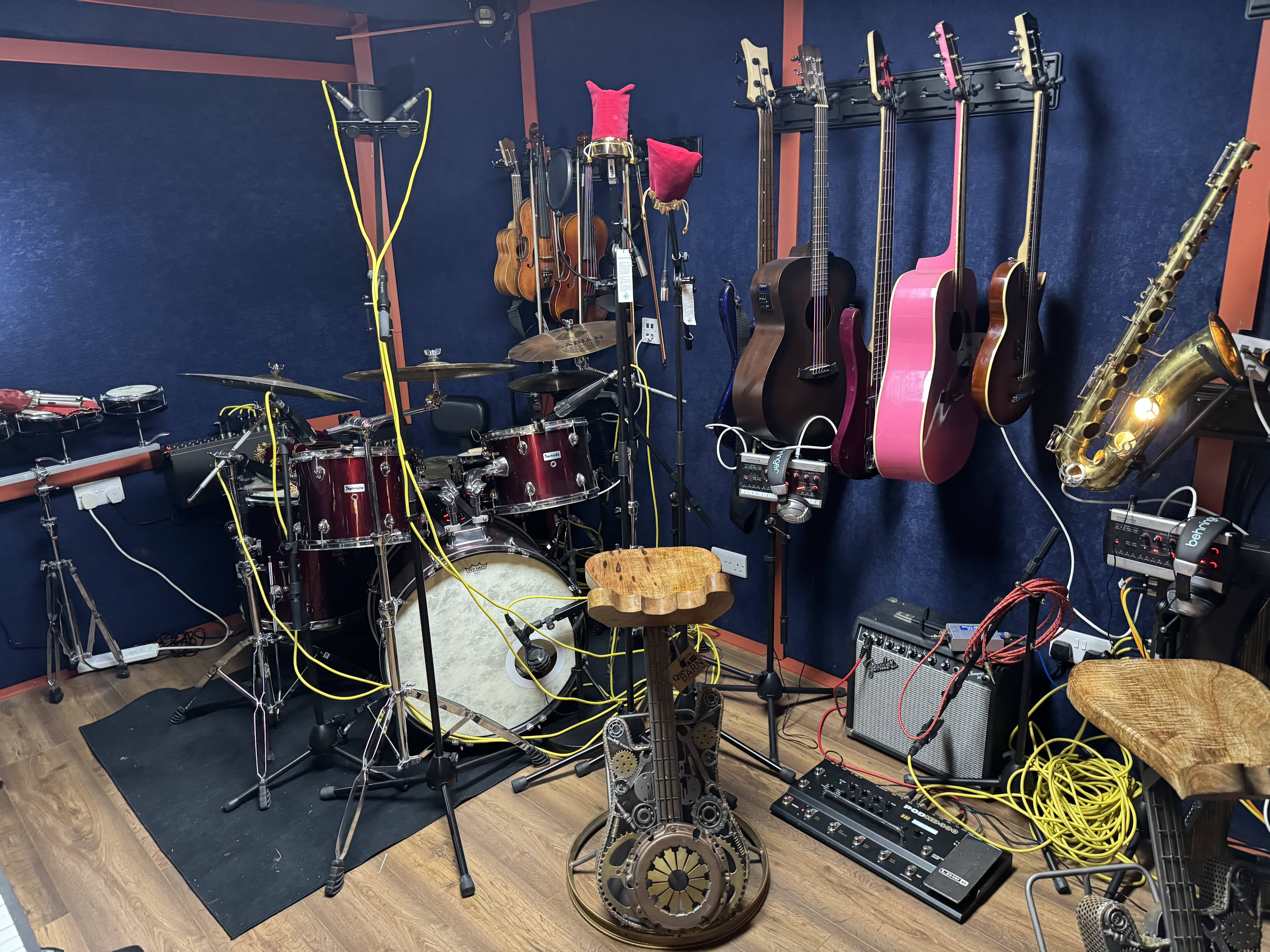 Amplifiers and instruments set up in the 4chordsStudios live room
