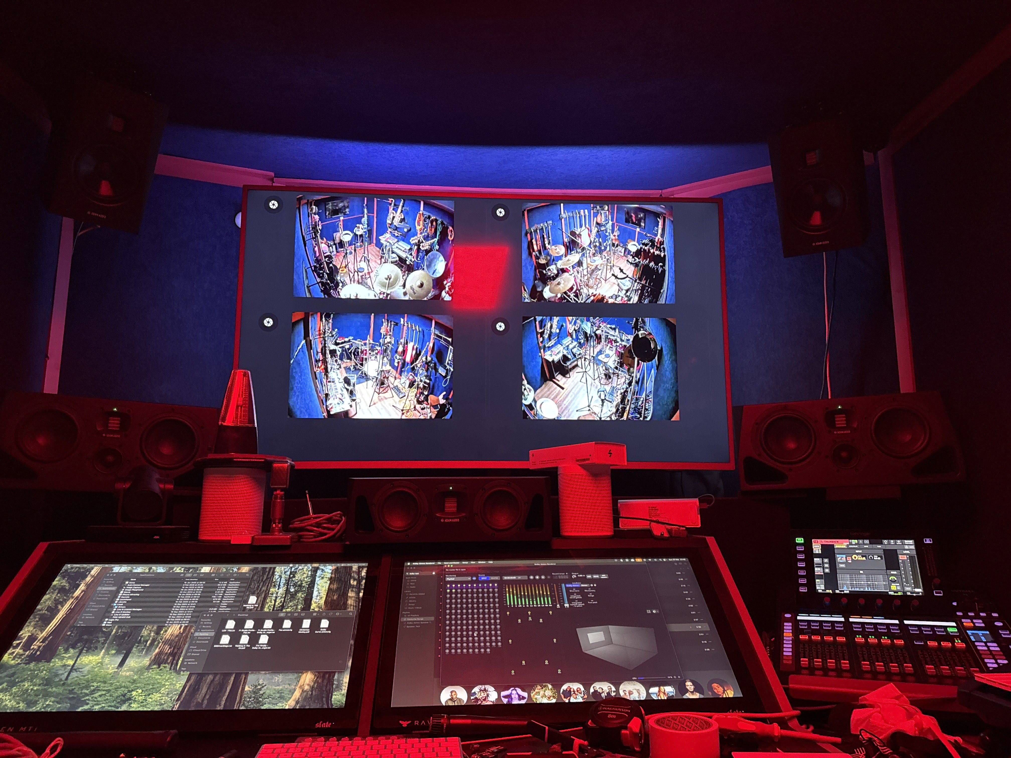 The 4chordsStudios control room with mixing console and live camera feeds