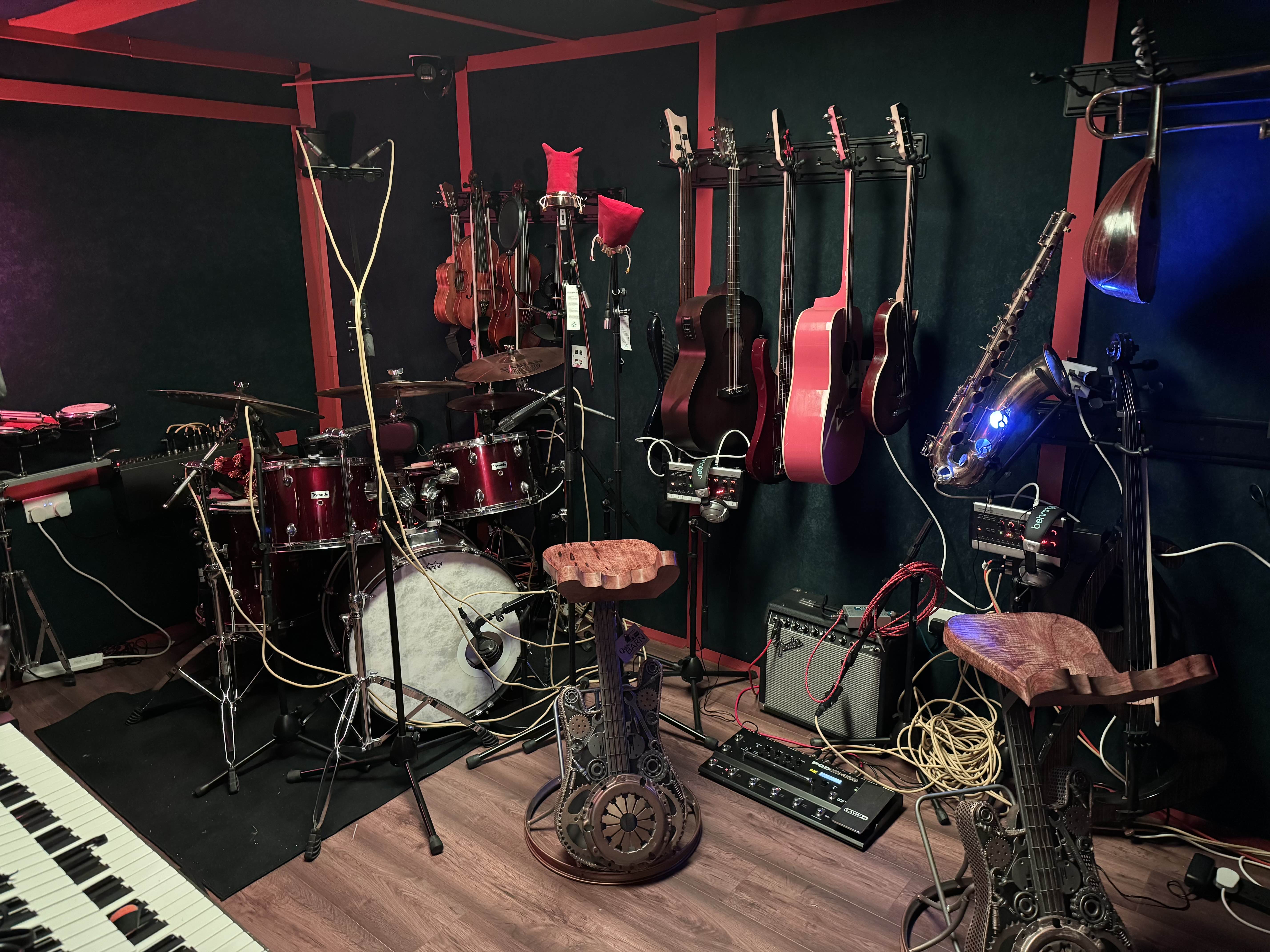 The 4chordsStudios live room, featuring the 1904 Steinway Model K and full drum kit