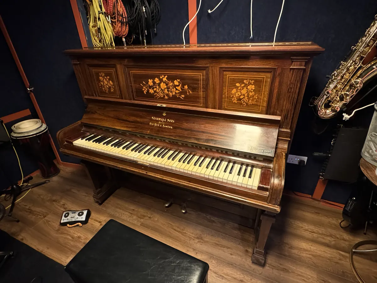 The 1904 Steinway & Sons upright piano, with inlaid panels, in the 4chordsStudios live room